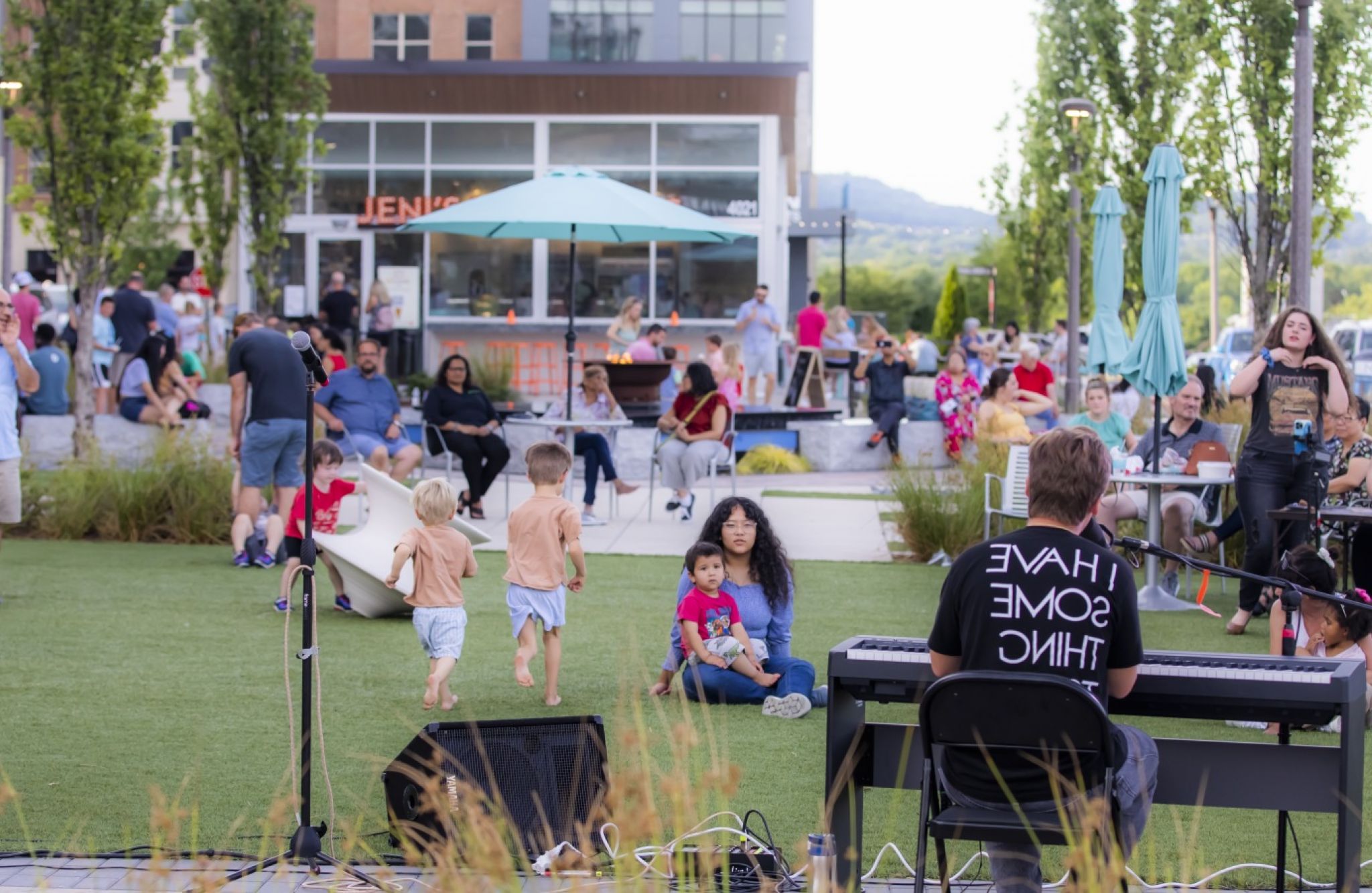 Group event on outdoor lawn in the McEwen Northside District