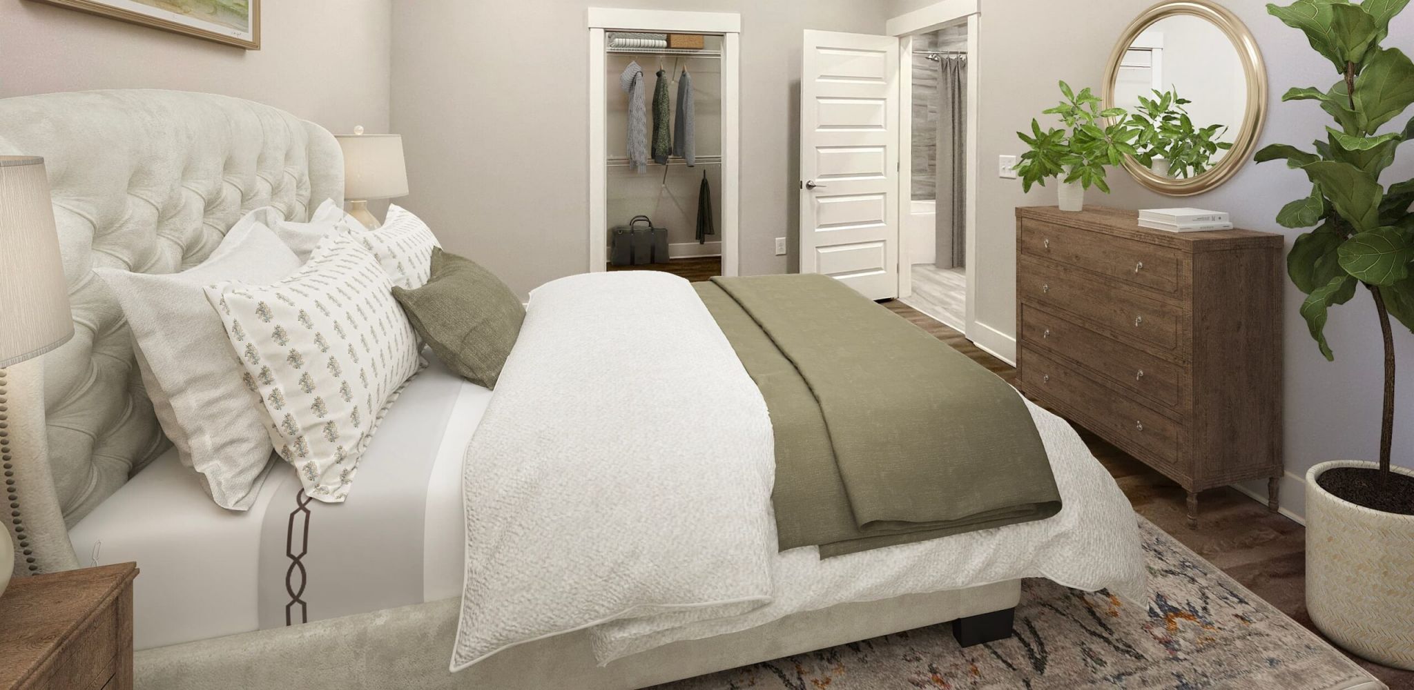 Furnished bedroom with king sized bed at McEwen Northside Apartments