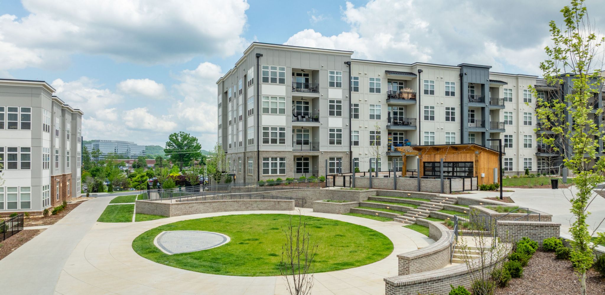 Designer lighting, large island, and designer cabinets at McEwen Northside Apartments