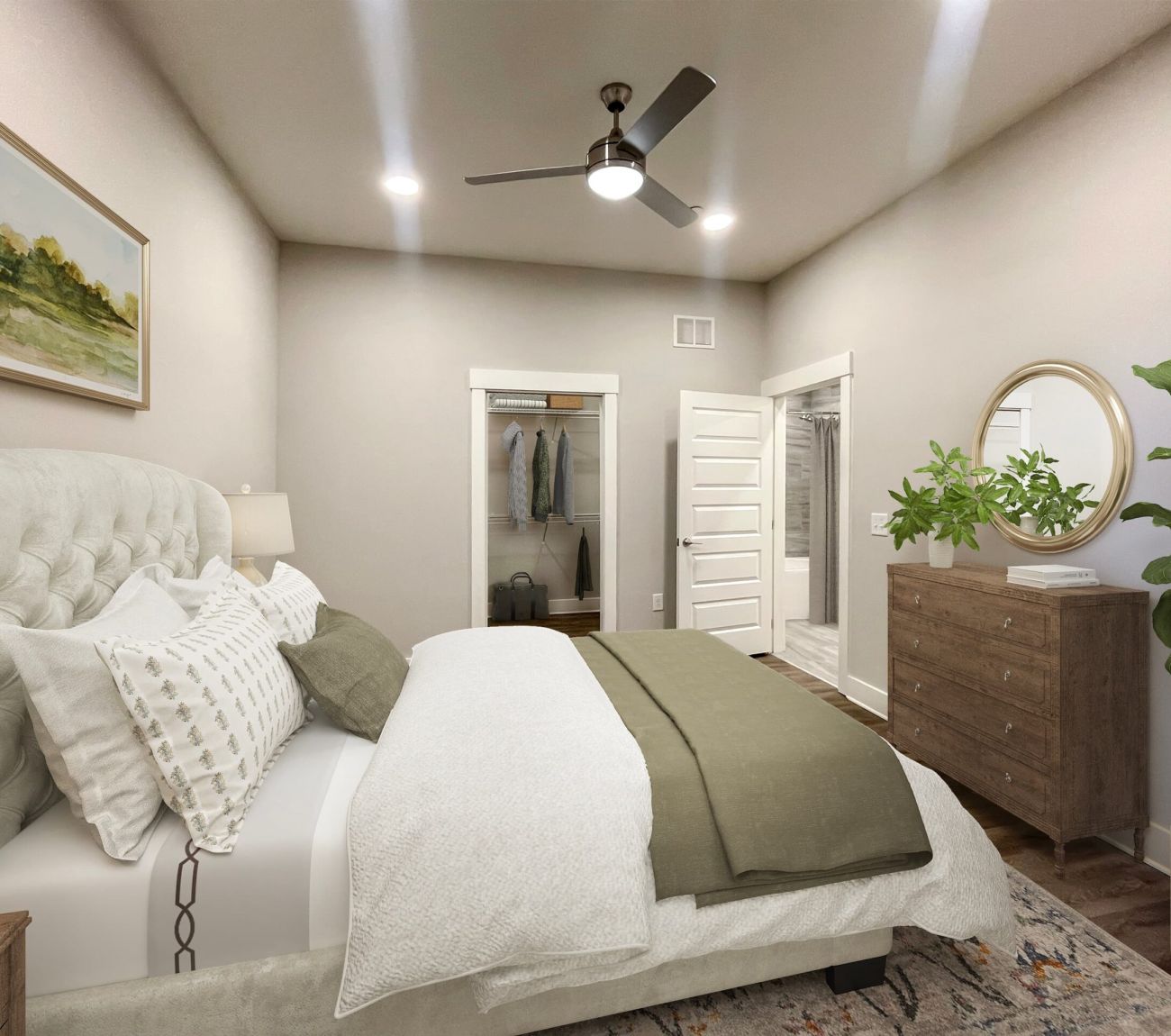 Furnished bedroom with king sized bed at McEwen Northside Apartments